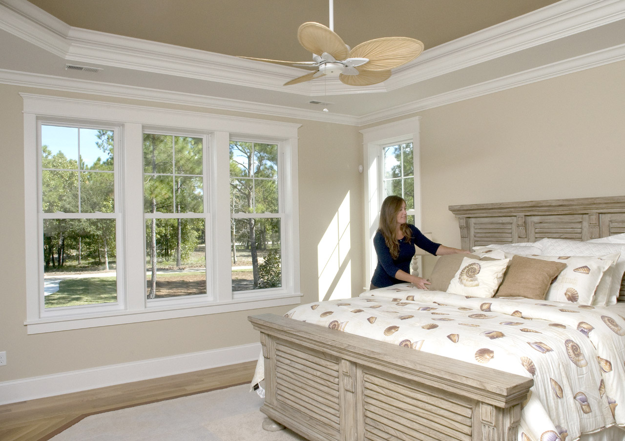 Homeowner enjoys sunlight through Simonton ProFinish Master Series window.